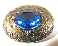 Vintage 1950s Sapphire Rhinestone and Etched Oval Gold Toned Pin - Front - Thumbnail