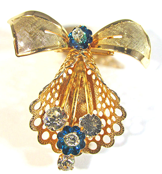 Vintage 1960s Clear and Blue Rhinestone Gold Festive Bell Pin - Front