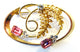 Vintage 1950s Pink and Clear Rhinestone Gold-Toned Oval Pin