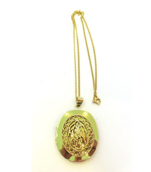Dramatic 1950s Dramatic Mid-Century Oval Gold Locket and Chain - Front