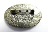 Antique 1910s Blue Rhinestone Black and Gold Enameled Silver Pin