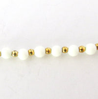 Marvella Vintage 1970s Ivory and Gold Bead Necklace with Hang Tag - Close Up - Thumbnail