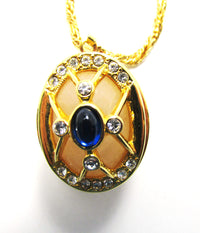 Vintage 1990s Joan Rivers Faberge Egg Sapphire-Blue Cabochon Locket - Close  Up - Thumbnail