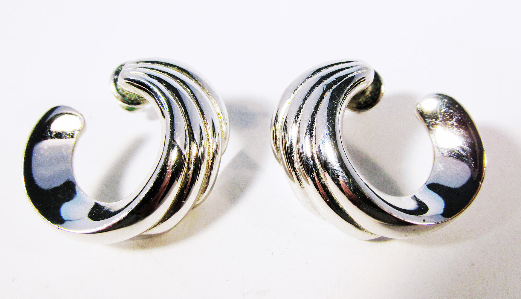 Vintage Monet 1970s Designer Contemporary Style Swirl Earrings - Front